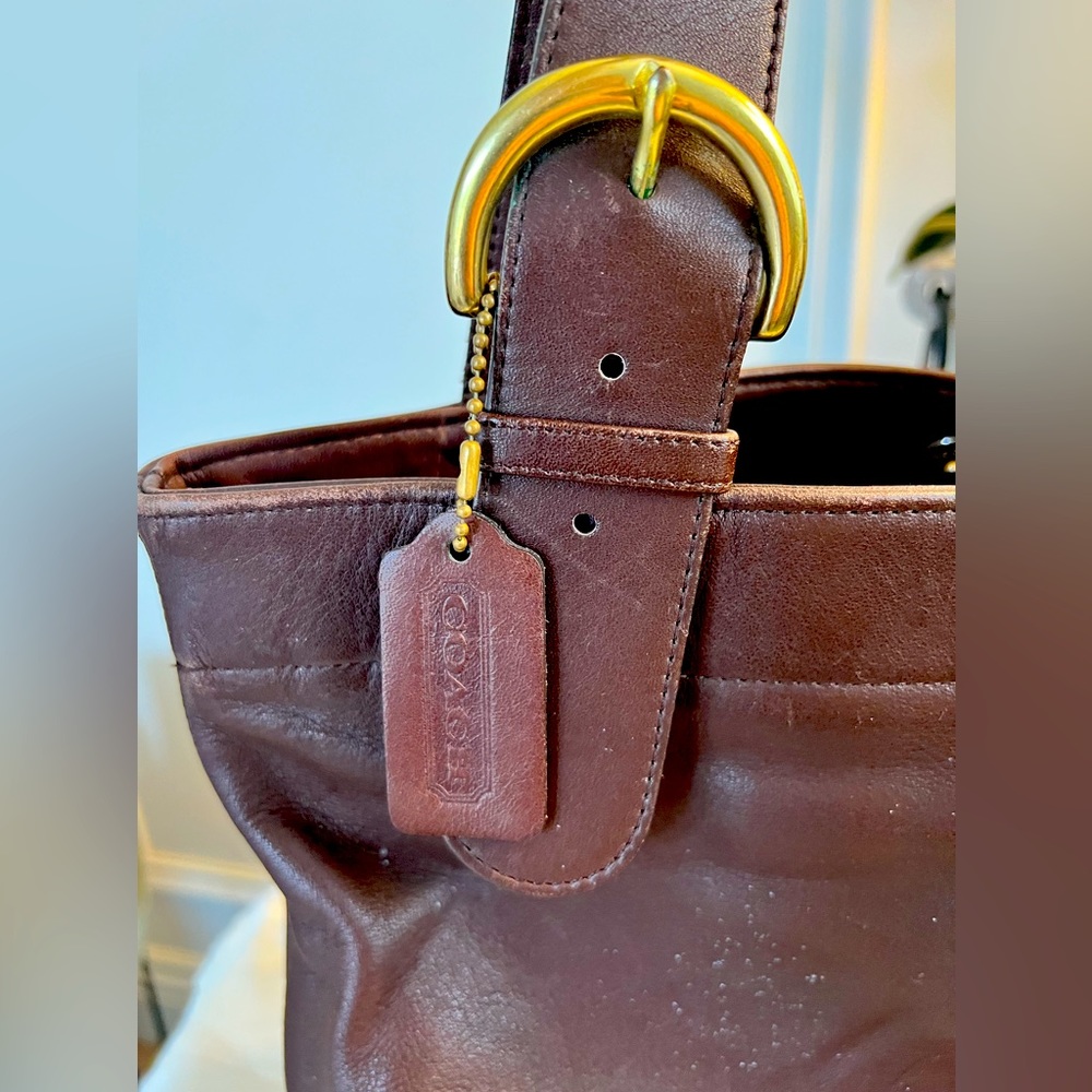 Vintage Coach purse in great condition. Dark brown leather with gold hardware.